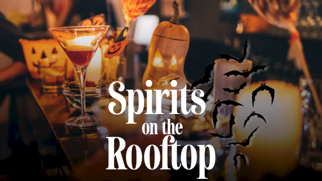 Halloween rooftop party scene with martinis and pumpkins, bats/ghost silhouettes, and the title &ldquo;Spirits on the Rooftop&rdquo;.