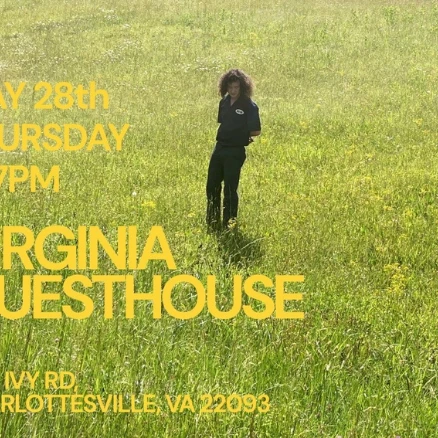 A person stands in a sunny, grassy field with bold yellow text for an event: &ldquo;May 28th Thursday 4-7PM Virginia Guesthouse&rdquo; in large letters, 2017 IV RD Charlottesville, VA 22903.