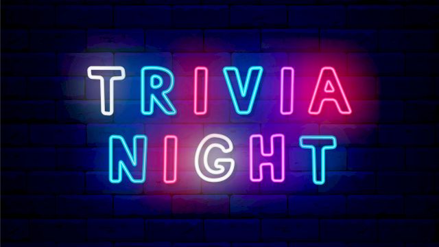 A neon sign reading &ldquo;TRIVIA&rdquo; and &ldquo;NIGHT&rdquo; glowing in bright blue, pink, and purple against a dark brick wall background.